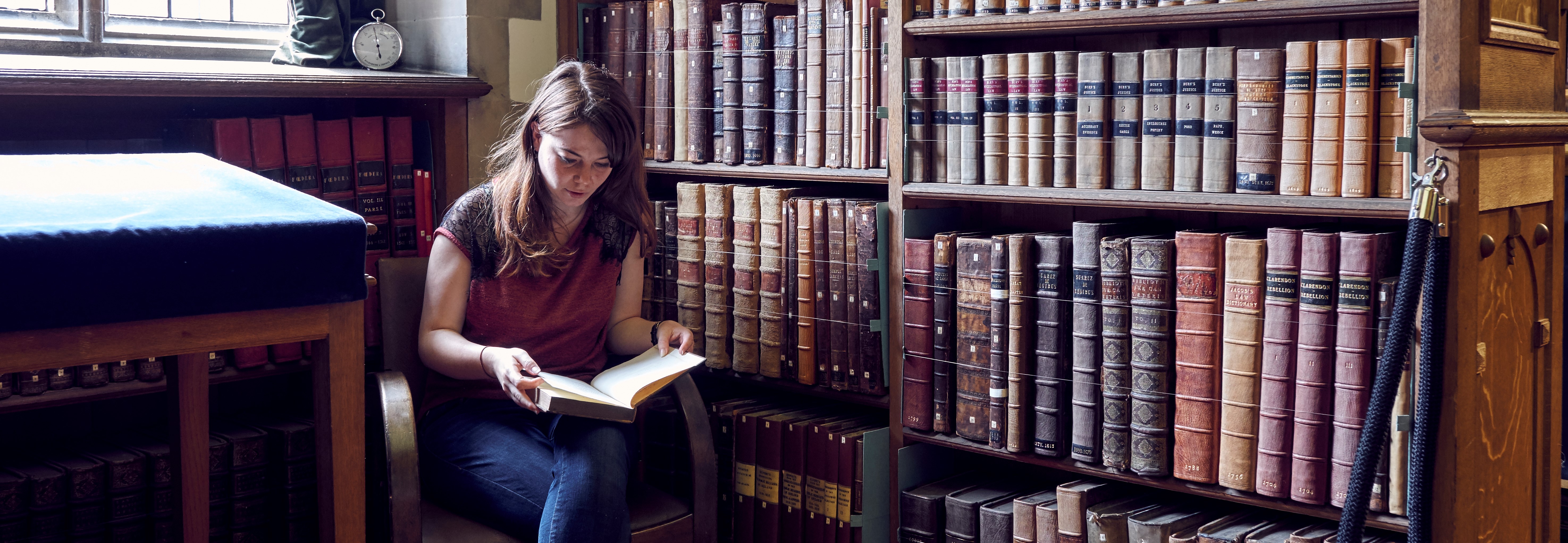 Student reading in the Old Library