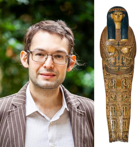 Headshot of man alongside Egyptian sarcophagos