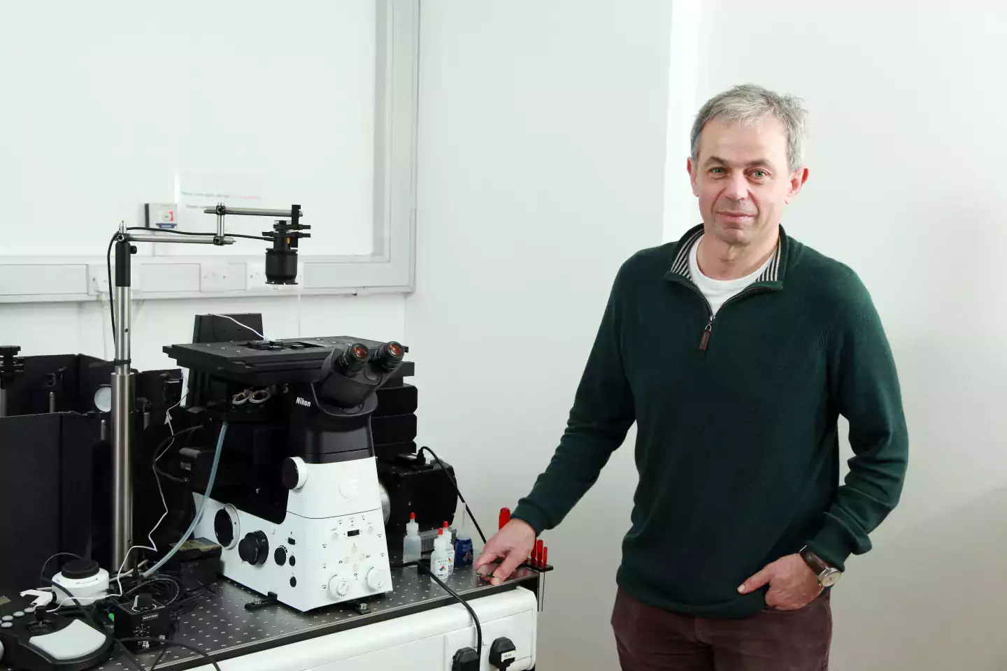 David Klenerman with laboratory equipment