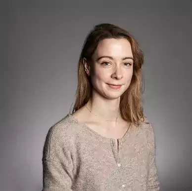 Harriet Lyon headshot with beige jumper